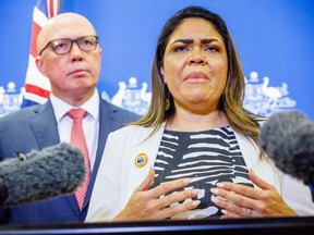 Shadow minister for Indigenous Australians Jacinta Nampijinpa Price (right) and Opposition Leader Peter Dutton attend a press conference following the results of Australia's historic Indigenous rights referendum, in Brisbane on Oct. 14, 2023.
