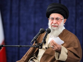 This handout picture provided by the office of Iran's Supreme Leader Ayatollah Ali Khamenei shows him speaking before an audience in Tehran on Oct. 25, 2023.