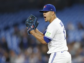 Blue Jays' Jose Berrios reacts after a strikeout in the first inning against the New York Yankees at Rogers Centre on Sept. 27, 2023 in Toronto.