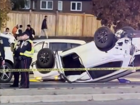 A screengrab from video posted to TikTok shows a car on its roof in the aftermath of a huge multi-vehicle pileup on Oct. 28, 2023 in Brampton.