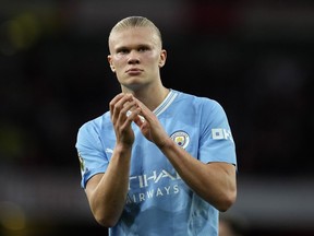 Manchester City's Erling Haaland applauds to supporters after his team lost the English Premier League soccer match between Arsenal and Manchester City at the Emirates Stadium in London, Sunday, Oct. 8, 2023.