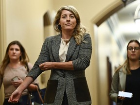 Minister of Foreign Affairs Melanie Joly arrives for a meeting of the federal cabinet on Parliament Hill in Ottawa, on Tuesday, Oct. 3, 2023.