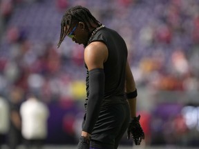 Minnesota Vikings wide receiver Justin Jefferson warms up before an NFL football game against the Kansas City Chiefs, Sunday, Oct. 8, 2023, in Minneapolis.