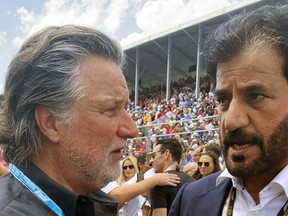 FILE - Michael Andretti, left, talks with FIA President Mohammed bin Sulayem before the Formula One Miami Grand Prix auto race at Miami International Autodrome, Sunday, May 8, 2022, in Miami Gardens, Fla. The FIA on Monday, Oct. 2, 2023, said Michael Andretti meets all required criteria to field a future Formula One team. Monday's announcement was a first -- but important -- step in Andretti's three-year quest to return one of racing's most storied names to the pinnacle of motorsports.