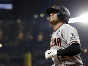 Arizona Diamondbacks' Gabriel Moreno celebrates after hitting a home run in the fourth inning against the Texas Rangers during Game 2 of the World Series at Globe Life Field on Oct. 28, 2023 in Arlington, Texas.