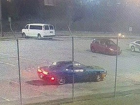blue Dodge Challenger outside of a central Georgia jail