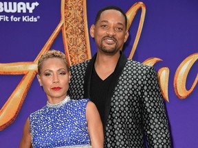 Will Smith and Jada Pinkett Smith are pictured in May 2019.