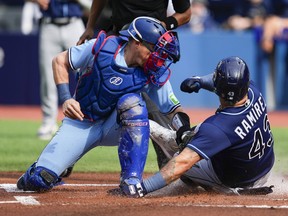 Harold Ramirez of the Tampa Bay Rays scores