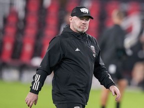 Then D.C. United head coach Wayne Rooney walks off the field after the team's MLS soccer match against Inter Miami, July 8, 2023, in Washington.