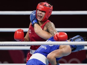 Canada's Tammara Thibeault, left, punches Netherlands' Nouchka Fontijn during their women's middleweight 75-kg boxing match at the 2020 Summer Olympics, Saturday, July 31, 2021, in Tokyo, Japan. Thibeault qualified for the 2024 Olympic Games in Paris by advancing to the final at the Pan American Games.