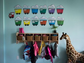 Children's backpacks and shoes are seen at a daycare.