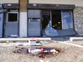 Shown is the aftermath of ransacked liquor store in Philadelphia, Wednesday, Sept. 27, 2023. Police say groups of teenagers swarmed into stores across Philadelphia in an apparently coordinated effort, stuffed bags with merchandise and fled.