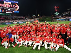 The Philadelphia Phillies pose after defeating the Miami Marlins 7-1 in Game Two of the Wild Card Series at Citizens Bank Park on Oct. 4, 2023 in Philadelphia, Pa.