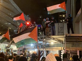 Pro-Palestinian rally at was held at Toronto's Yonge and Bloor streets outside of the Israeli consulate after a pro-Israeli rally at the University of Toronto on Oct. 17, 2023.
