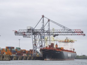A container ship is loaded in the Port of Montreal,