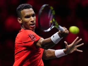 Team World's Felix Auger-Aliassime returns to Team Europe's Gael Monfils during the second set of a Laver Cup tennis singles match, in Vancouver, on Friday, September 22, 2023. Auger-Aliassime headlines the Canadian roster for the upcoming Final 8 stage of the Davis Cup Finals.