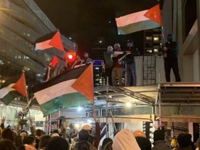 The Toronto4Palestine movement took over Yonge and Bloor on Tuesday evening to protest an Israeli bombing of a Gaza hospital that the White House said came from the Palestinian side - photo by Joe Warmington