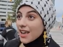 Essra Karam created quite a stir when showing up at the Pro-Palestinian protest Saturday at Mississauga city hall wearing machine-gun earrings and a martyr T-shirt -- photo courtesy Rebel News