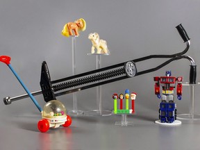 This photo provided by the National Toy Hall of Fame shows five toys that have been finalists for induction multiple times - he pogo stick, the Fisher-Price Corn Popper, My Little Pony, PEZ dispensers, and Transformers.  (National Toy Hall of Fame via AP)