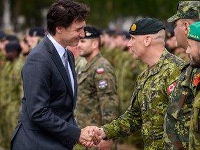 Prime Minister Justin Trudeau meets the Canada-led multinational NATO enhanced Forward Presence Battle Group in the Adazi military base in Riga, Latvia, on July 10, 2023.