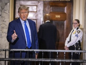 Former President Donald Trump comments to the media during a break of his civil business fraud trial at New York Supreme Court, Tuesday, Oct. 24, 2023, in New York.