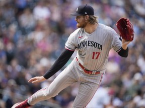Minnesota Twins starting pitcher Bailey Ober works against the Colorado Rockies in the fourth inning of a baseball game, Sunday, Oct. 1, 2023, in Denver.
