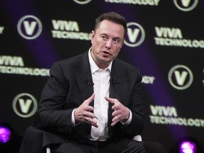 Elon Musk, who owns Twitter, Tesla and SpaceX, speaks at the Vivatech fair, June 16, 2023, in Paris.