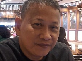 Enrique Vinluan, 53, was murdered
