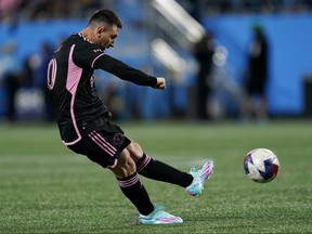Inter Miami forward Lionel Messi shoots a free kick.
