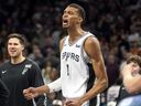 San Antonio Spurs' Victor Wembanyama pumps his fist after the team's win over the Phoenix Suns.