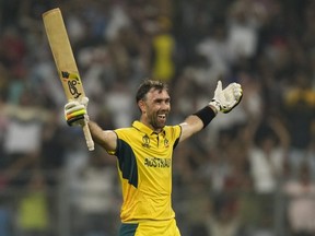 Australia's Glenn Maxwell celebrates after their win in the ICC Men's Cricket World Cup match against Afghanistan.