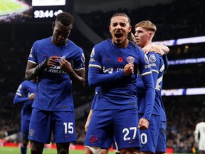 Malo Gusto of Chelsea celebrates after teammate Nicolas Jackson scores the team's fourth goal against Spurs.