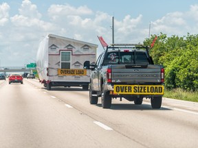 Off-site housing truck makes delivery