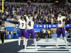 Baltimore Ravens wide receiver Zay Flowers (4) celebrates after his touchdown catch against the Los Angeles Chargers.