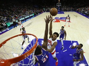 Scottie Barnes #4 of the Toronto Raptors shoots over Joel Embiid #21 of the Philadelphia 76ers during the first half at the Wells Fargo Center on November 02, 2023 in Philadelphia. (Photo by Tim Nwachukwu/Getty Images)