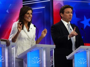 Republican presidential candidates Nikki Haley and Ron DeSantis participate in a debate.