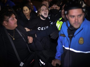 Protesters clash with members of U.S. Capitol Police.