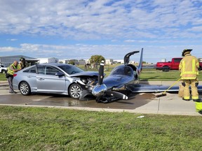 This photo provided by the McKinney Fire Department shows officials at the site of a crash involving a small plane and a vehicle near Aero Country Airport, Saturday, Nov. 11, 2023, in McKinney, Texas.