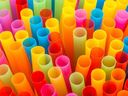 Closeup of Colourful drinking straws background.