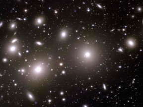This undated handout obtained on Nov. 2, 2023 from the European Space Agency ESA shows an alternative crop of an astronomical image of galaxies belonging to the Perseus Cluster taken during ESA's Euclid space mission, which is built and operated by the European Space Agency ESA and with contributions from NASA.
