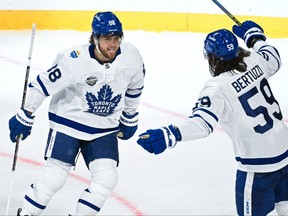 Maple Leafs' Tyler Bertuzzi (right) celebrates with teammate William Nylander after scoring a goal against the Detroit Red Wings during the NHL Global Series in Stockholm, Sweden.