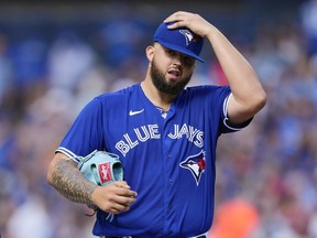 Alek Manoah of the Toronto Blue Jays reacts after hitting Taylor Ward of the Los Angeles Angels with a pitch during the fifth inning in their MLB game at the Rogers Centre on July 29, 2023 in Toronto.