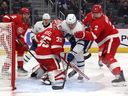 Bobby McMann of the Toronto Maple Leafs scores on Ville Husso of the Detroit Red Wings at Little Caesars Arena on January 12, 2023 in Detroit, Michigan.