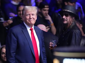 Donald Trump stands with Kid Rock