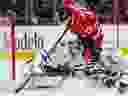 Maple Leafs goaltender Ilya Samsonov stops a shot from Chicago Blackhawks ' Jason Dickinson during the third period on Friday, Nov. 24, 2023, in Chicago. 