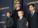 From left, Pax Jolie-Pitt, Brad Pitt, Shiloh Jolie-Pitt and Maddox Jolie-Pitt arrive at the Los Angeles premiere of