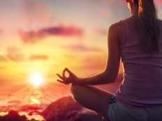 Yoga At Sunset - Woman In Meditation - Focus On Foreground And Blurred Background