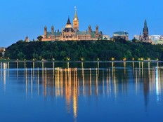 The Ottawa cityscape as seen at night.