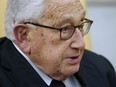 Former U.S. Secretary of State Henry Kissinger speaks during a meeting with the U.S. President in the Oval Office of the White House in Washington, D.C., Oct. 10, 2017.