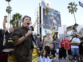 SAG-AFTRA captain Mary M. Flynn rallies fellow striking actors.